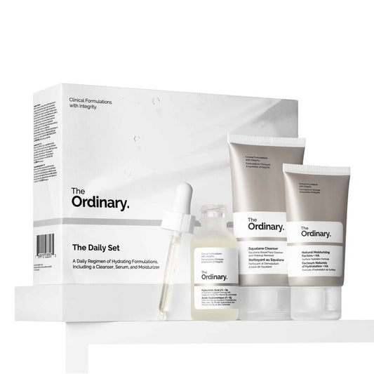 The Ordinary The Daily Set packaging featuring the Squalane Cleanser 50ml, Hyaluronic Acid 2% + B5 30ml, and Natural Moisturizing Factors + HA 30ml.