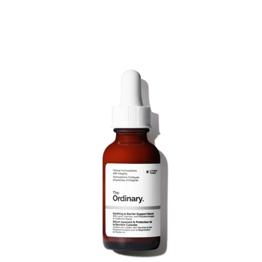 The Ordinary Soothing & Barrier Support Serum in its signature glass bottle, showing the distinctive vibrant pink emulsion liquid.