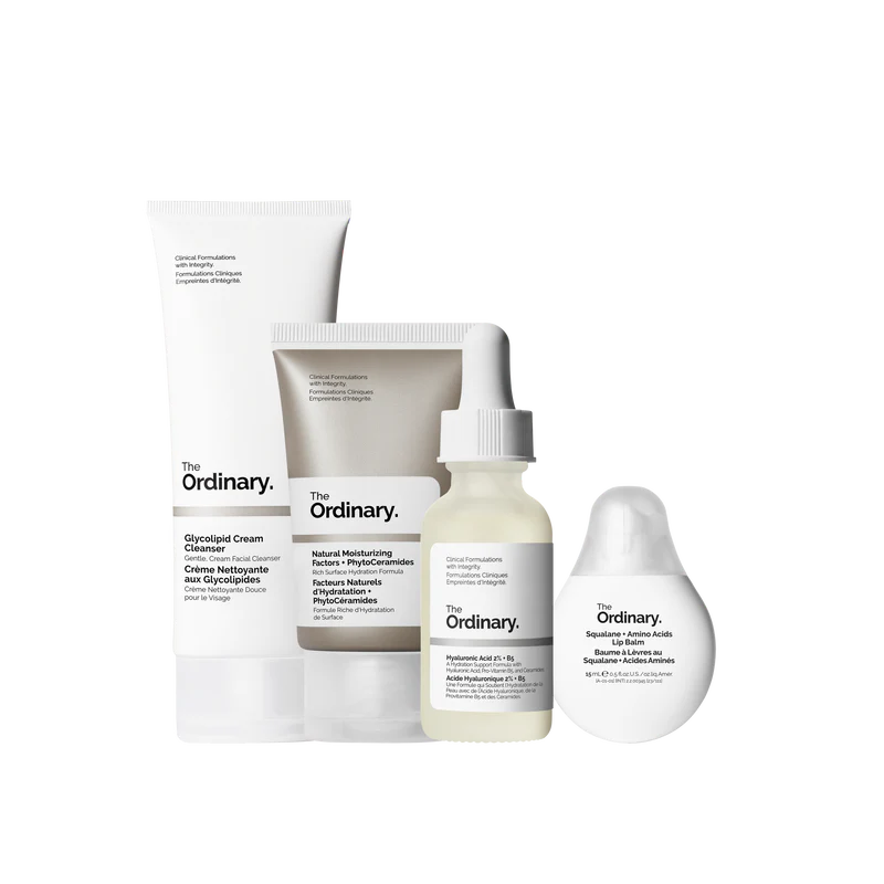 The Ordinary Hydration Collection featuring the Glycolipid Cream Cleanser, Hyaluronic Acid 2% + B5, NMF + PhytoCeramides, and Squalane Lip Balm on a minimalist white surface.