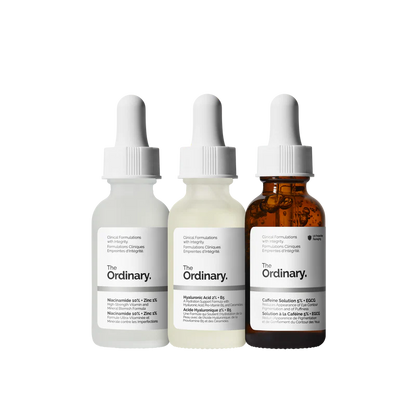 The Ordinary Most Loved Collection featuring three 30ml bottles—Niacinamide, Hyaluronic Acid, and Caffeine Solution—arranged on a minimalist white shelf.