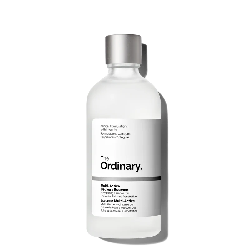 The Ordinary Multi-Active Delivery Essence in a 100ml clear bottle, showing the lightweight, water-like hydrating liquid on a clinical white background.