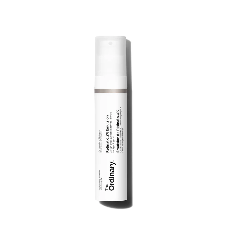 The Ordinary Retinal 0.2% Emulsion in its airless pump bottle, showcasing the vibrant yellow serum texture against a clinical white background.