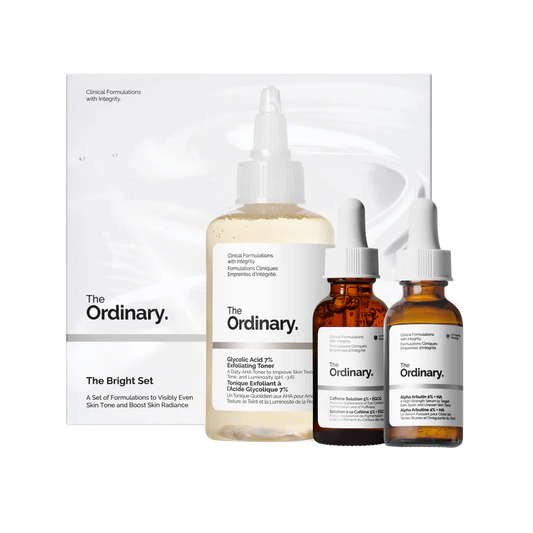 The Ordinary Bright Set featuring full-size bottles of Glycolic Acid 7% Exfoliating Toner, Alpha Arbutin 2% + HA, and Caffeine Solution 5% + EGCG on a minimalist white background.