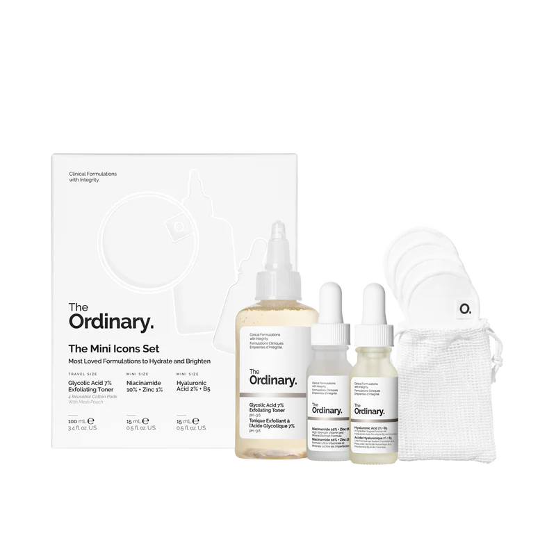 The Ordinary Mini Icons Set box containing miniature bottles of Glycolic Toner, Niacinamide, and Hyaluronic Acid alongside white reusable cotton pads.