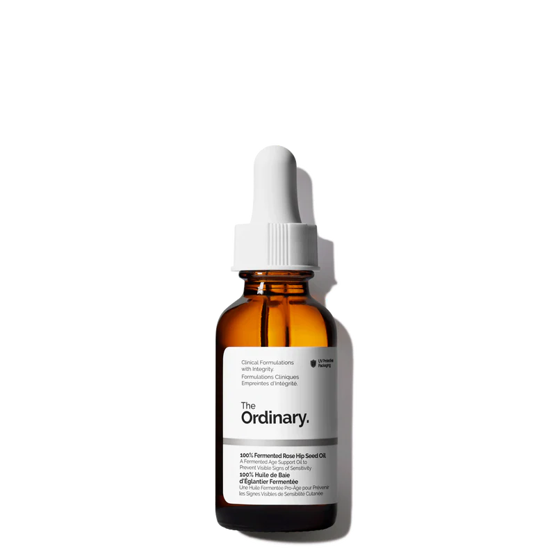 The Ordinary 100% Fermented Rose Hip Seed Oil 30ml amber glass bottle with a dropper, featuring a high-performance fermented plant oil for sensitive and aging skin.