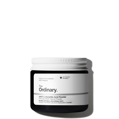 The Ordinary 100% L-Ascorbic Acid Powder in a 20g amber glass jar, including a small measuring spoon for easy mixing.