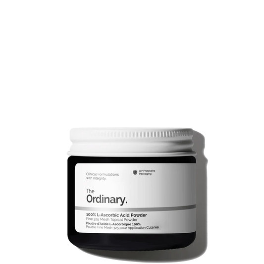The Ordinary 100% L-Ascorbic Acid Powder in a 20g amber glass jar, including a small measuring spoon for easy mixing.