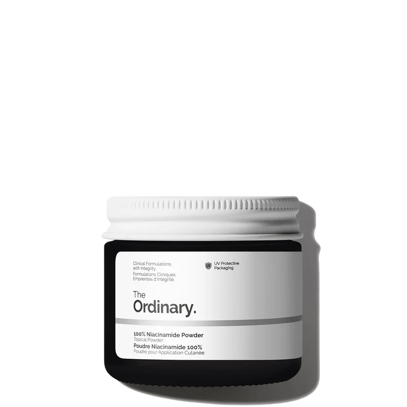 The Ordinary 100% Niacinamide Powder 20g jar with a signature small measuring spoon for precise, customizable skincare mixing.