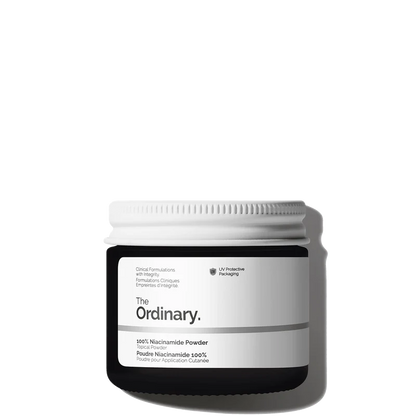The Ordinary 100% Niacinamide Powder 20g jar with a signature small measuring spoon for precise, customizable skincare mixing.