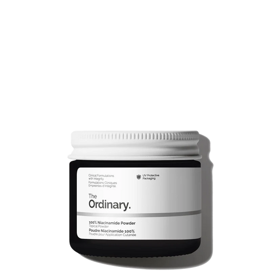 The Ordinary 100% Niacinamide Powder 20g jar with a signature small measuring spoon for precise, customizable skincare mixing.