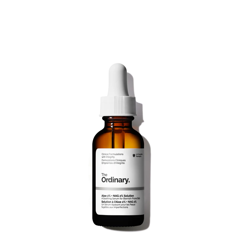 The Ordinary Aloe 2% + NAG 2% Solution 30ml clear glass bottle with a dropper, containing a lightweight, water-based serum designed for blemish-prone skin.