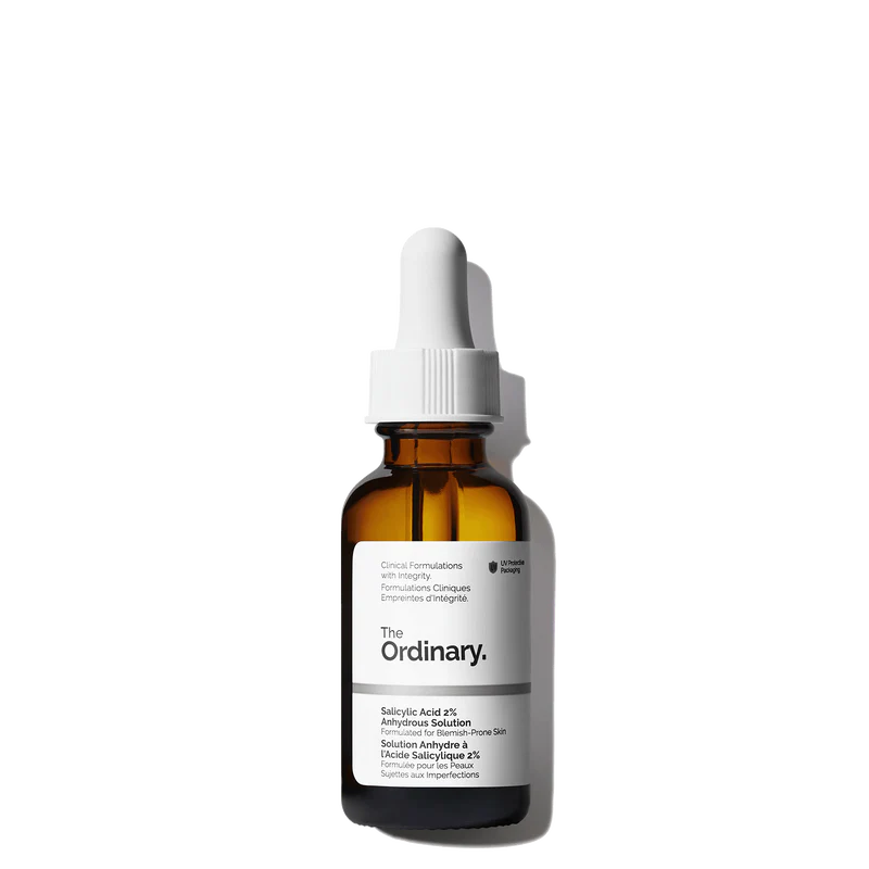 The Ordinary Salicylic Acid 2% Anhydrous Solution 30ml amber glass bottle with a dropper, designed to protect the oil-like formula from light.